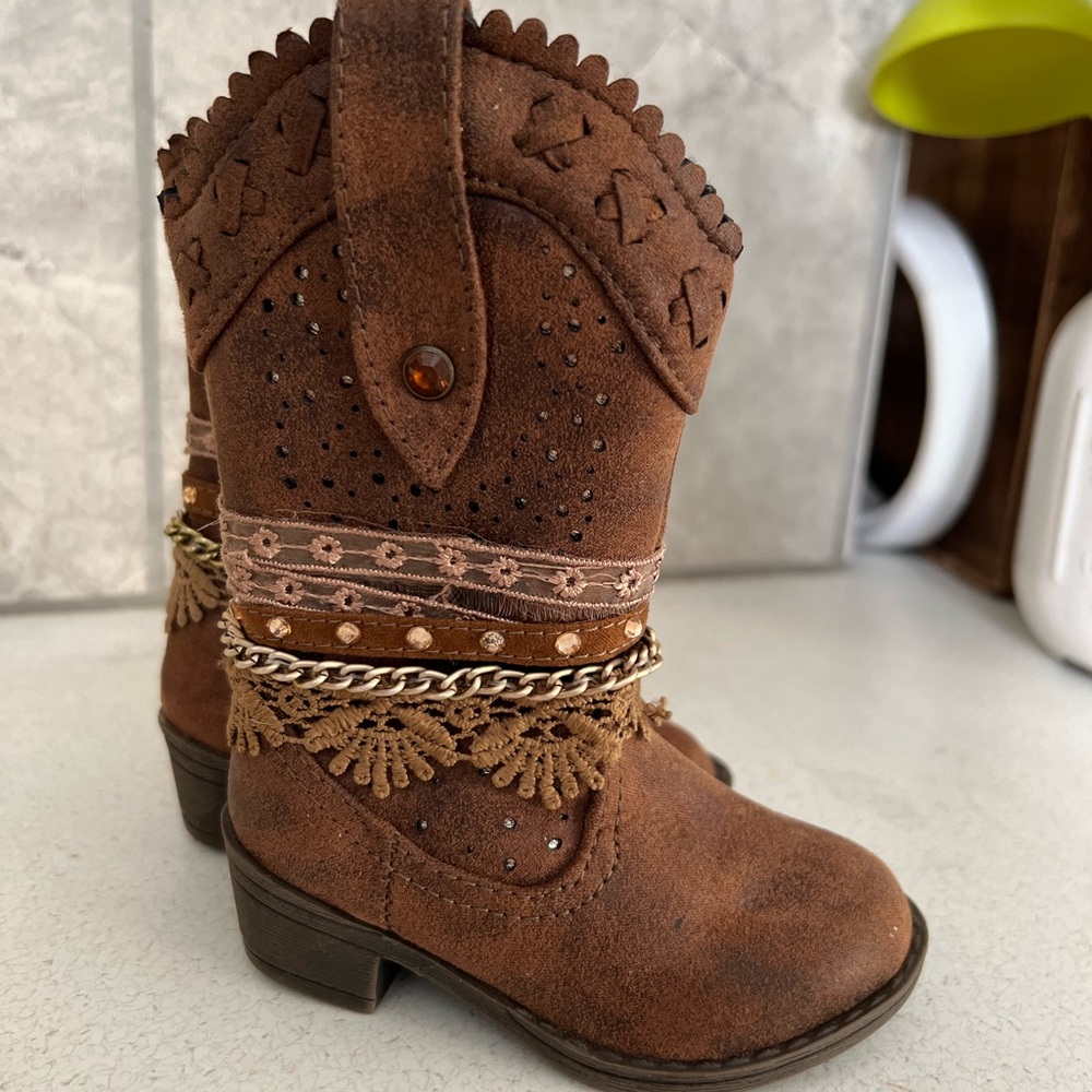 Cowgirl boots. Well loved but lots of life left. Flaws noted in photos.